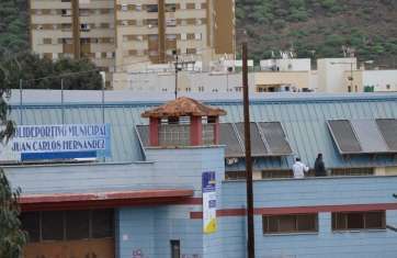 Trabajos en la cubierta del pabellón