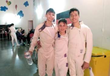 Jorge Morales, el primero por la izquierda, junto a Oramas Acosta, subcampeón, y el del centro es Agustín Daste, medalla de Bronce (Foto TA)