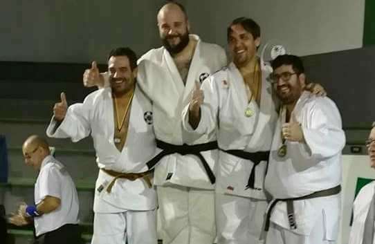 Deportistas de Taz Jinámar en el podio de ganadores (Foto TA)