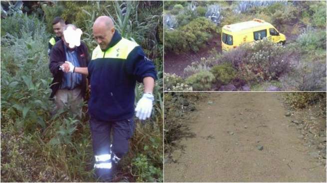 Un vecino es ayuda por personal del SUC para llegar desde su casa a la ambulancia y estado en que ha quedado el camino (Foto TA)