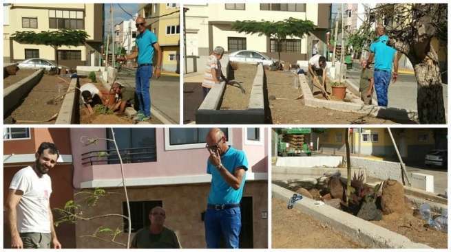 Vecinos que participaron en las tareas de adecentar los parterres de la plaza (Foto TA)
