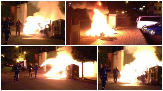 Intervención de los bomberos en los incendios de contenedores de anoche en Las Huesas (Foto TA)