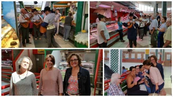 Los componentes de la agrupación folclórica Tajea, esta mañana durante su recorrido por el Mercado Municipal, y la alcaldesa y concejala de Agricultura (Foto TA)