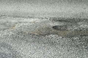 Foto de los socavones de la calle de África remitida a TA por vecinos de la zona.