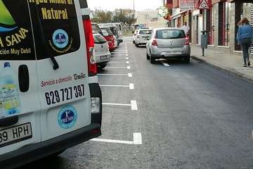 Vías y Obras asfalta en tiempo récord la calle más comercial de La Garita (Foto TA)