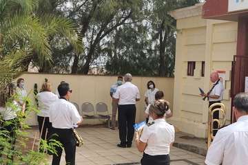 Mini concierto de la Banda Municipal de Música en el Consultorio Médico de Ojos de Garza/TA.