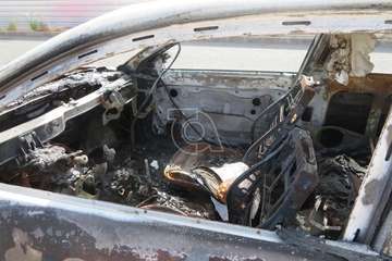 Desvalijado y quemado en una calle de la urbanización Picachos/TA.