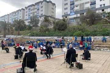Concierto navideño de la Banda Municipal de Música en el CEIP Montiano Placeres/TA.