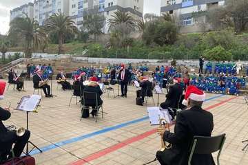 Concierto navideño de la Banda Municipal de Música en el CEIP Montiano Placeres/TA.