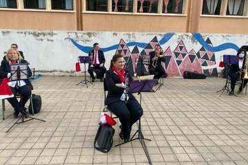 Concierto navideño de la Banda Municipal de Música en el CEIP Montiano Placeres/TA.