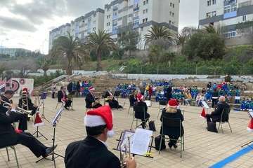 Concierto navideño de la Banda Municipal de Música en el CEIP Montiano Placeres/TA.