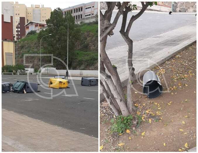 Contenedores y papeleras tiradas en el suelo/TA.