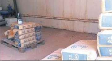 Sacos de cemento apilados en el interior del depósito (Foto C7)