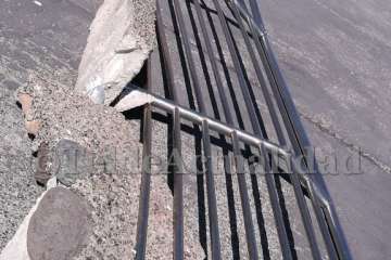 Playas arreglará los destrozos del oleaje a la valla metálica del muelle de Melenara-Telde (Foto TA)