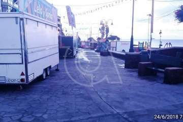 Trabajos de limpieza en la playa de Melenara tras la Noche de San Juan (Foto TA)