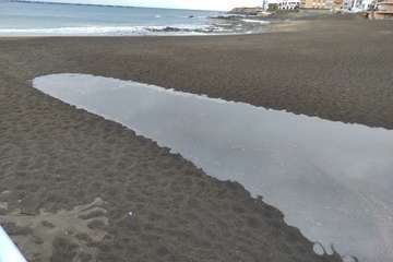  Telde se empapa con las primeras lluvias y el agua comienza a correr por sus barranquillos/TA.