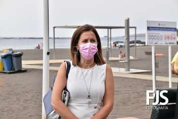 Izado de la bandera azul en Melenara/TA.