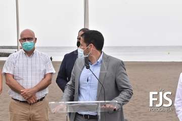 Izado de la bandera azul en Melenara/TA.