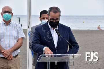 Izado de la bandera azul en Melenara/TA.