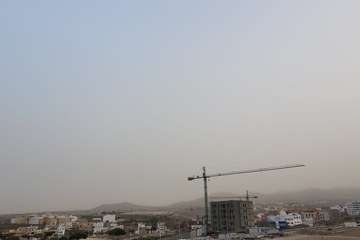 La calima entra con fuerza y reduce la visibilidad en Telde/Antonio Rico, Jesús Ruiz Mesa y TA.