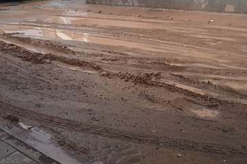 Barrizal en calles de Melenara/TA.