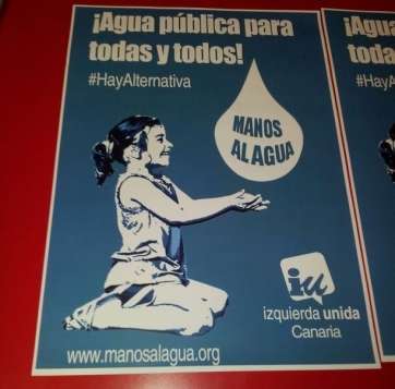 Cartel del partido pidiendo agua pública para todos (Foto TA)