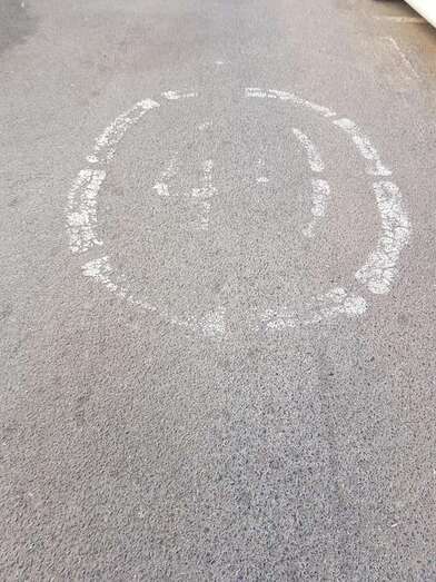 Imagen de una señal sobre una calle en la playa de Ojos de Garza / TA