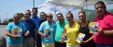 Miembros del Patronato de Fiestas y concejales, con el programa festivo de este año (Foto TA)