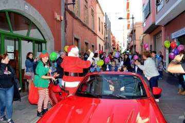Papá Noel infunda alegría navideña a los más pequeños de Telde (Reportaje Francisco J. Santana)