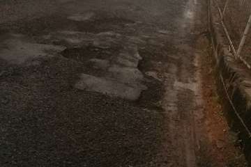 La calle de Bencomo, entre el Caracol y Pedro Paso, más baches imposible (Foto TA)
