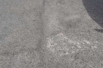 Desperfectos de la calle de Gardenia/TA.