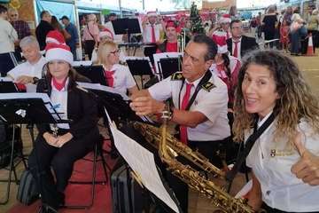  La Breña agasaja con churros y chocolate a Papá Noel y la Banda de Música alegra el Mercado de Telde/TA.