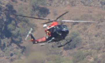 Imagen de archivo de un helicóptero del GES en una búsqueda en el barranco de Los Cernícalos (Foto TA)