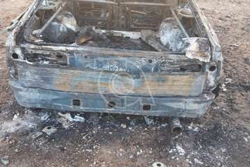 Un vehículo arde en un solar situado frente al Aeropuerto de Gran Canaria (Telde)/TA.